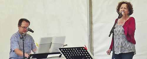 Clemas Music performing on stage at the Jazz Festival held at Kinghtshayes in Tiverton
